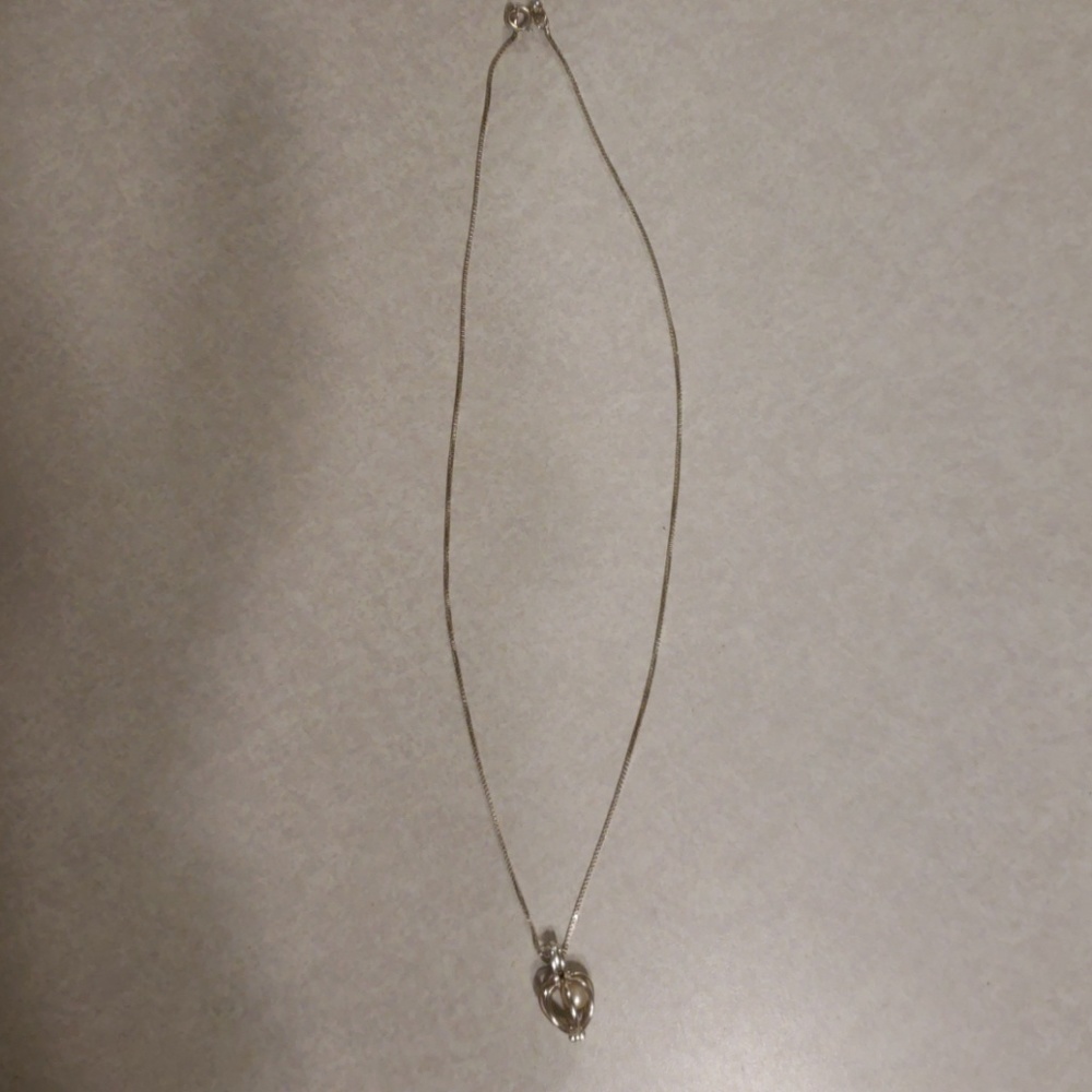 Sterling silver pearl cage necklace
